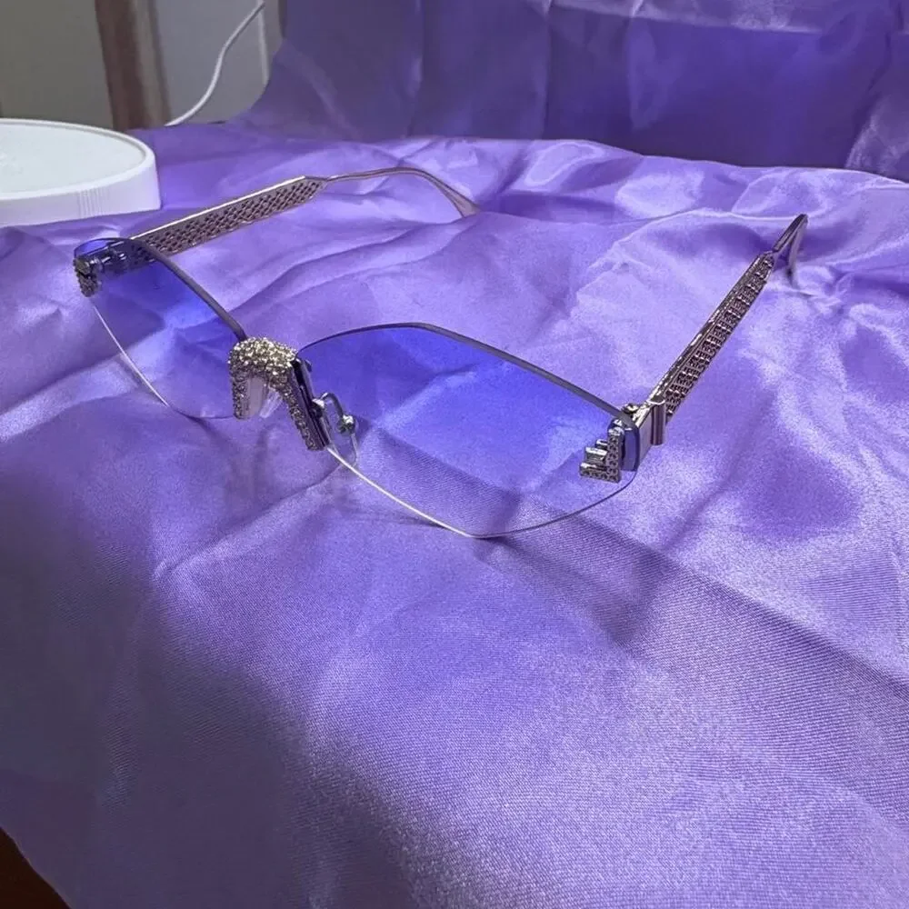 Women's blue Icy rimless sunglasses sparkly rimless glam quiet luxury rich